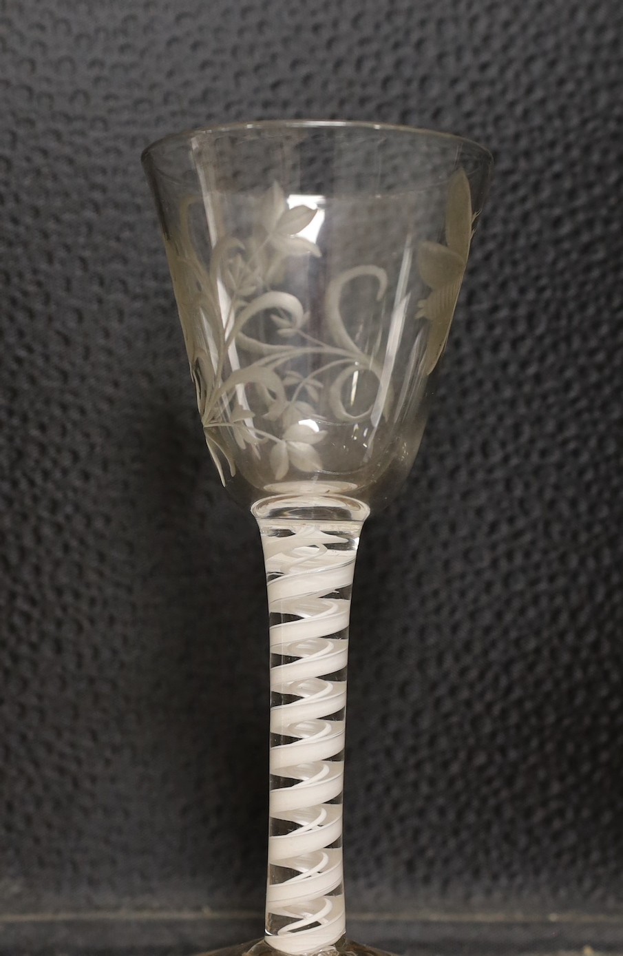 Three 18th century Jacobite type double series opaque twist stem wine glasses, 15cm tall